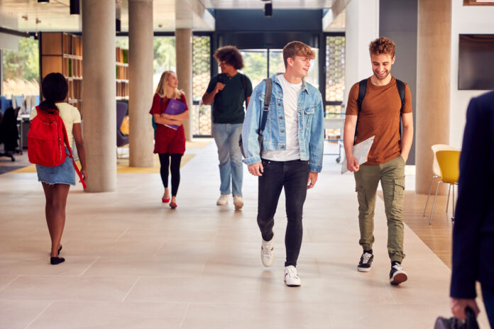 CollegeStudentsWalkingLibrary-1600×1067